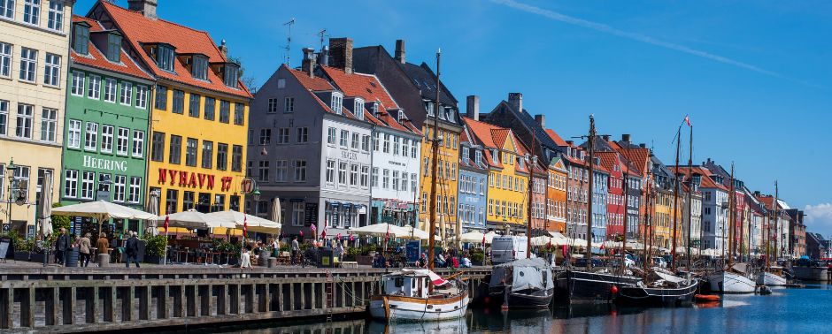 Nyhavn's colorful houses and wooden boats along the canal
