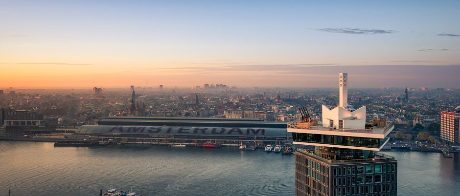 Amsterdam's city skyline on a nclear evening with the A'DAM tower in the right foreground