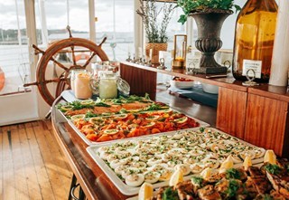 Shrimp and salmon buffet onboard M/S S:t Erik - salmon, eggs, and smoked fish