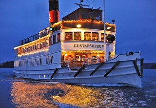 The ship M/S Gustafsberg VII with string lights and Christmas decorations