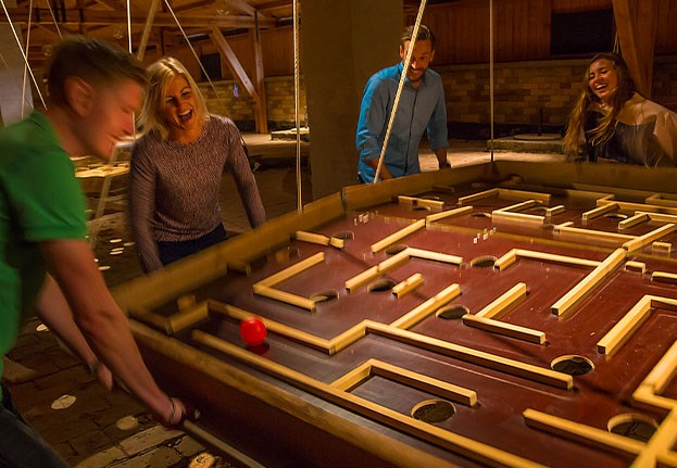 People are having fun at the team-building activity Christmas Team Challenge at Vaxholms Kastell