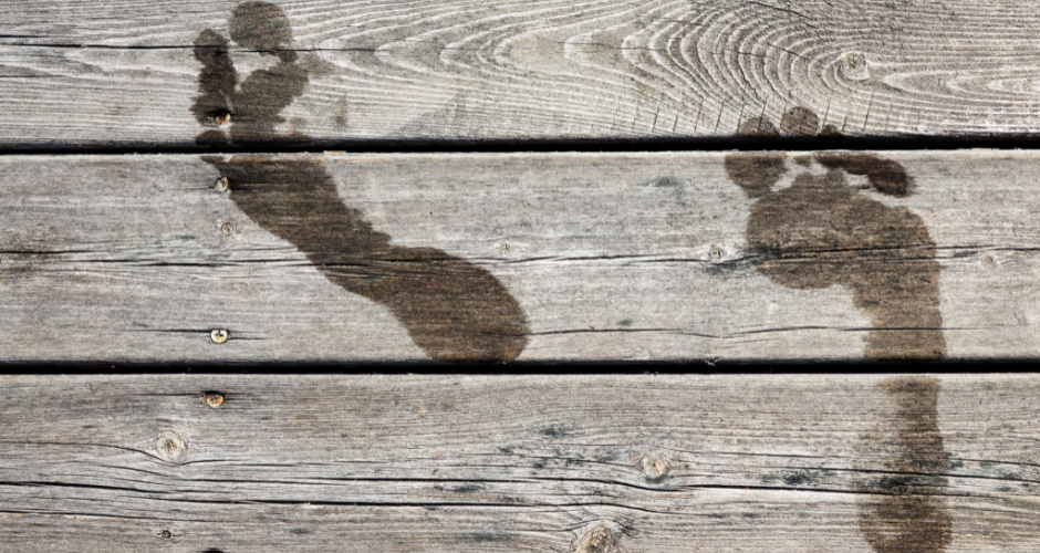  Wet footprints on a jetty