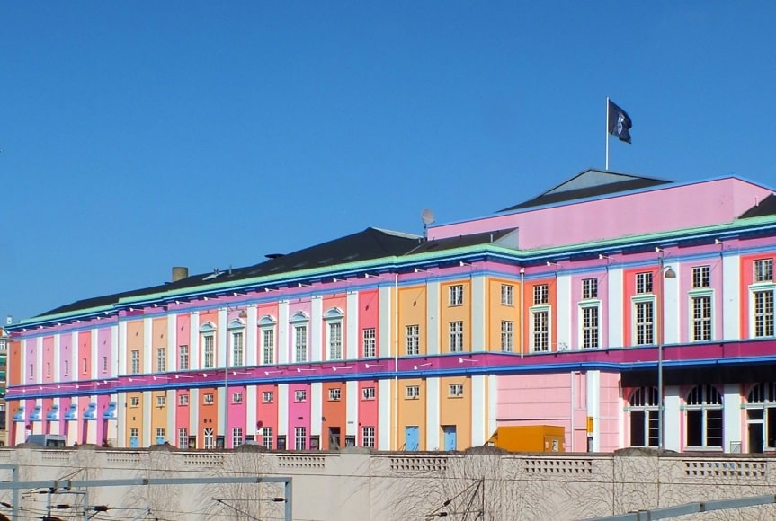 Pastel colored movie theatre in Copenhagen. Photo by WOCO.