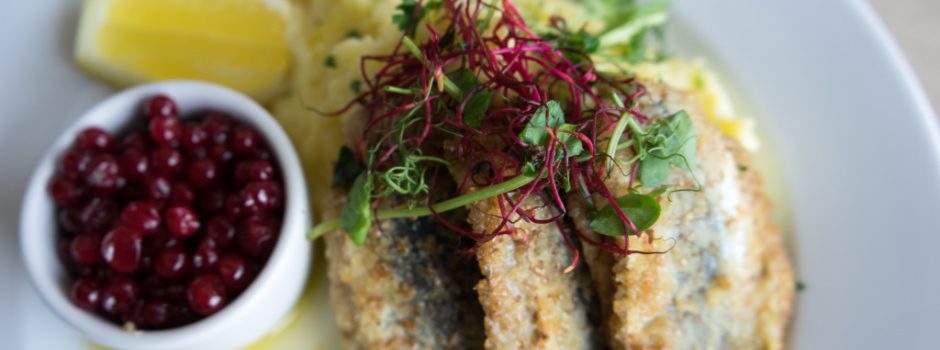 Classic Swedish food - fried herring with lingonberries